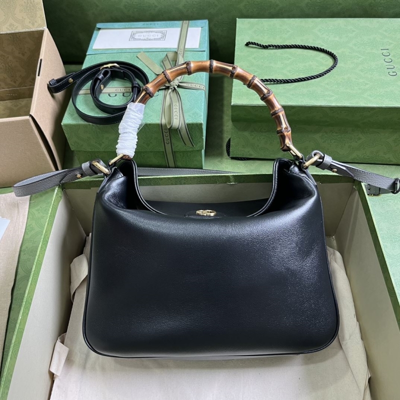 G*u*i top handle bags